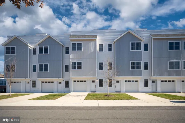 a view of building with yard