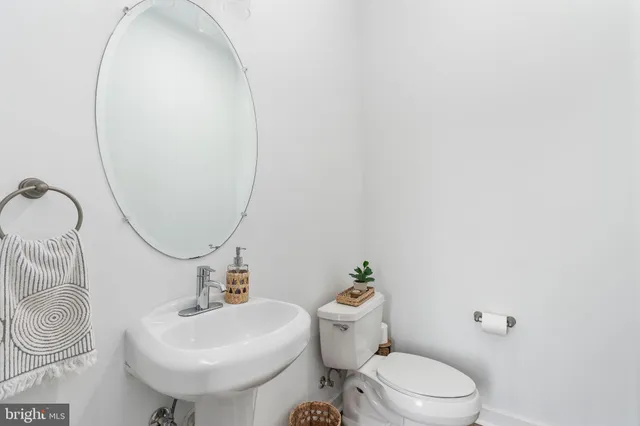 a bedroom with bed and a window