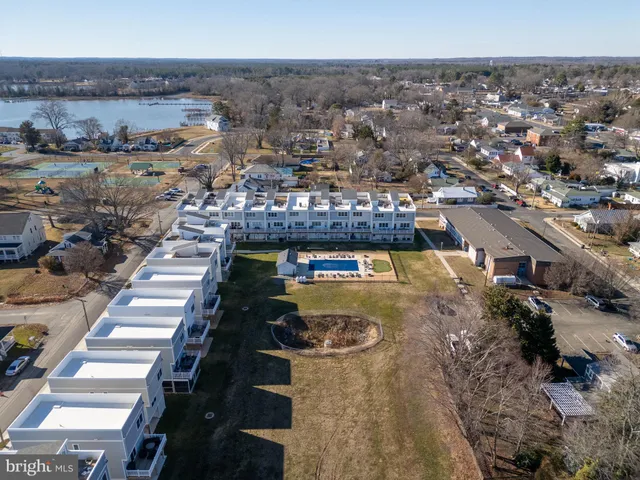 an aerial view of houses and roads