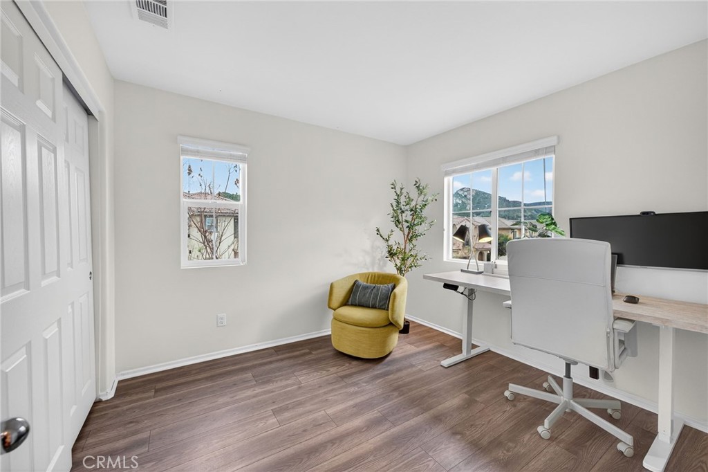 35462 Brown Galloway Lane Fallbrook, CA 92028 - Photo 33 of 63 a workspace with wooden floor and a window