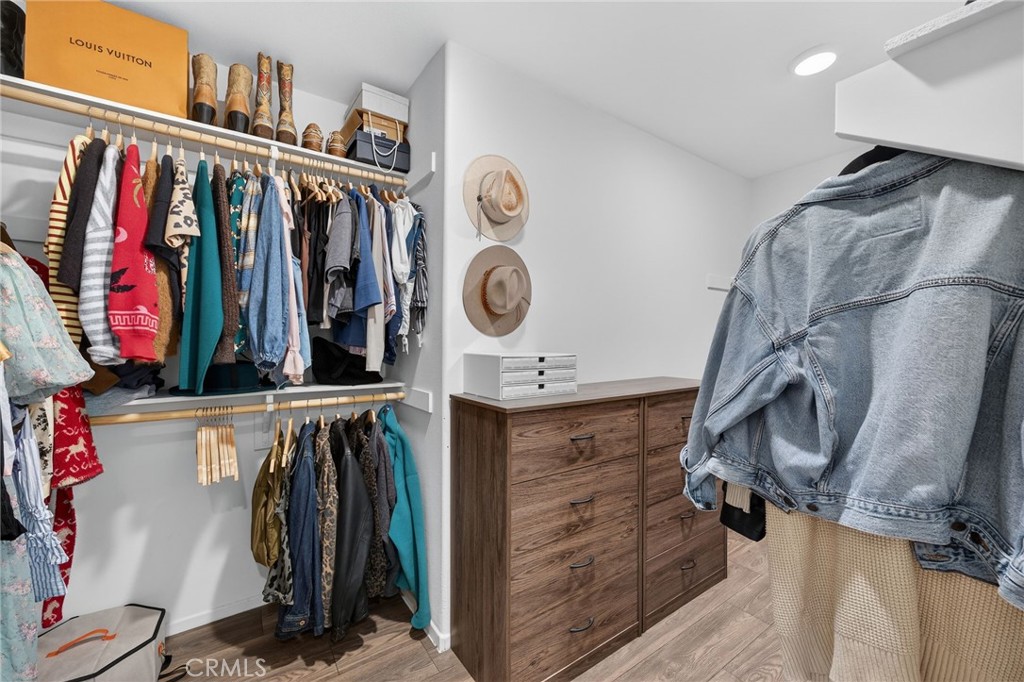 35462 Brown Galloway Lane Fallbrook, CA 92028 - Photo 44 of 63 a view of walk in closet with clothes and shoes