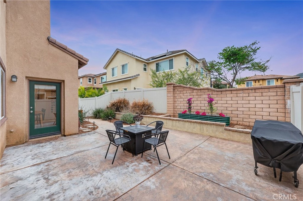 35462 Brown Galloway Lane Fallbrook, CA 92028 - Photo 51 of 63 a patio with table and chairs and potted plants
