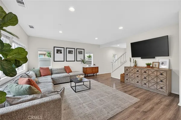a bathroom with a sink mirror and toilet