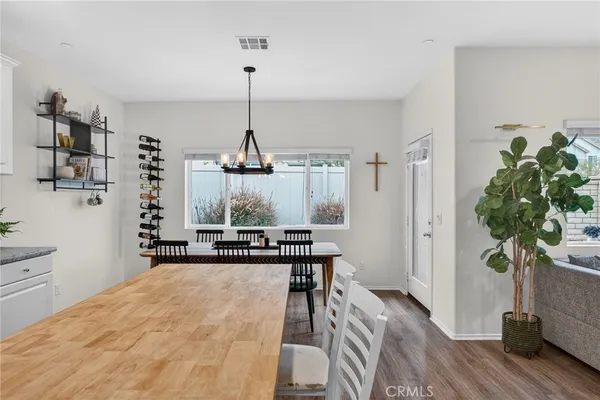 a view of a livingroom with wooden floor