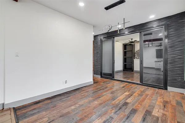 a view of a kitchen and windows