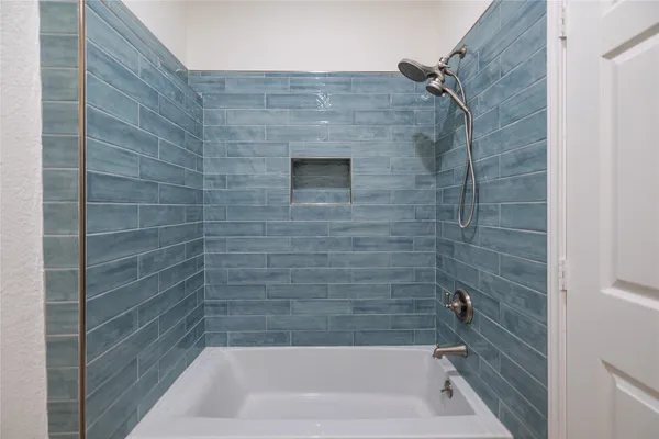 a bathroom with a bathtub