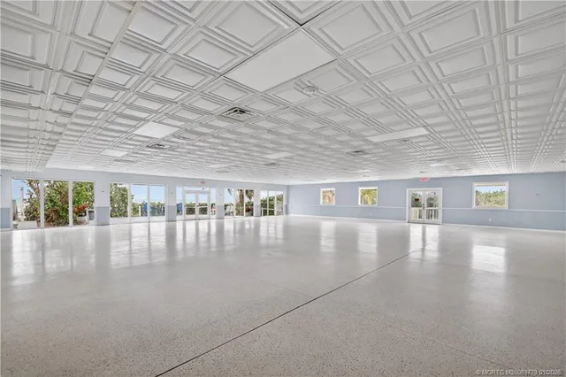 a view of a balcony with furniture