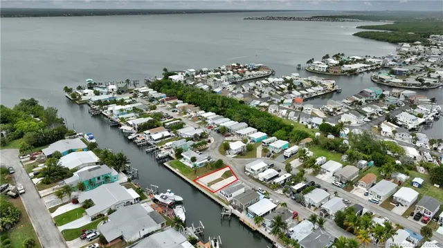 a view of multiple houses with outdoor space