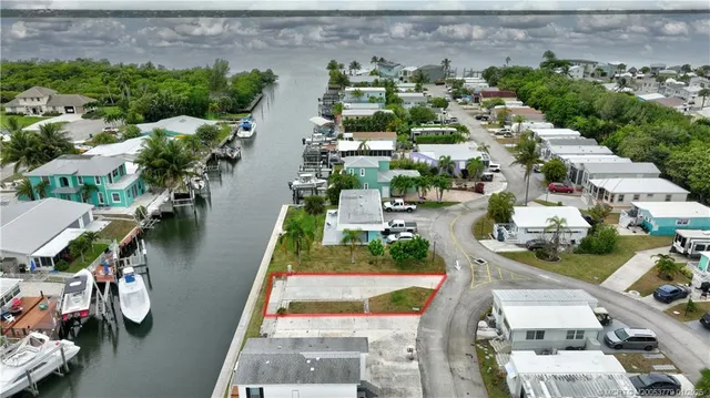 a view of a swimming pool and a yard