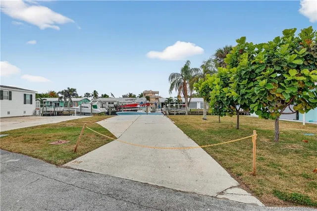 a view of a lake with a yard