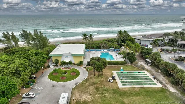 a view of swimming pool with seating space