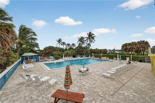 a view of a balcony with chairs