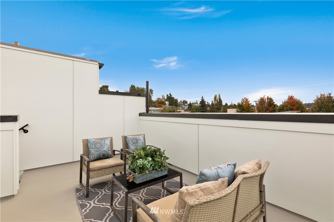 3638 36th Avenue South, Unit D Seattle, WA 98144 - Photo 16 of 30 a view of balcony with furniture