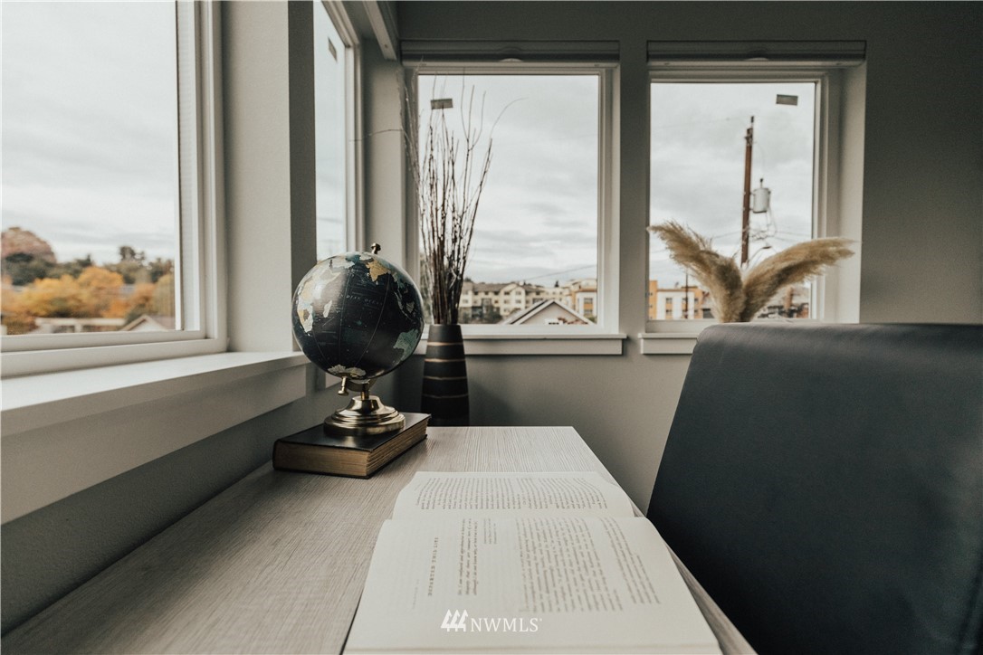 3638 36th Avenue South, Unit D Seattle, WA 98144 - Photo 23 of 30 a living room with a large window