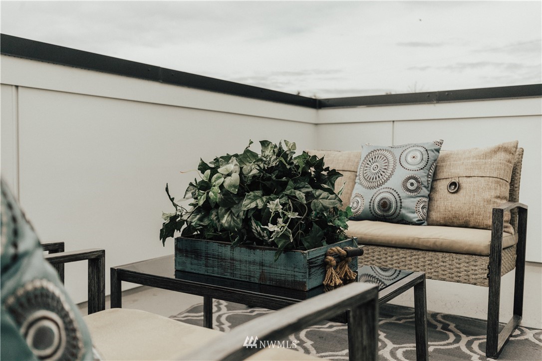 3638 36th Avenue South, Unit D Seattle, WA 98144 - Photo 25 of 30 a living room with furniture