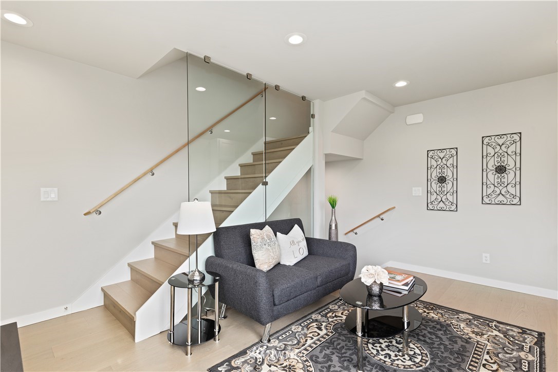 3638 36th Avenue South, Unit D Seattle, WA 98144 - Photo 4 of 30 a living room with furniture and wooden floor