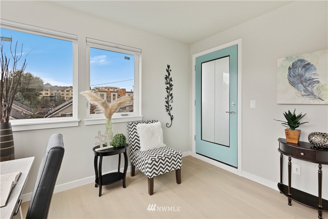 3638 36th Avenue South, Unit D Seattle, WA 98144 - Photo 7 of 30 a living room with furniture and a window