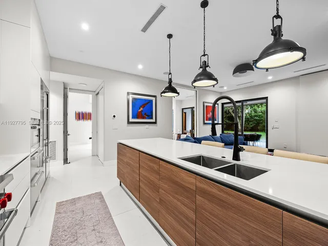 a view of kitchen and sink