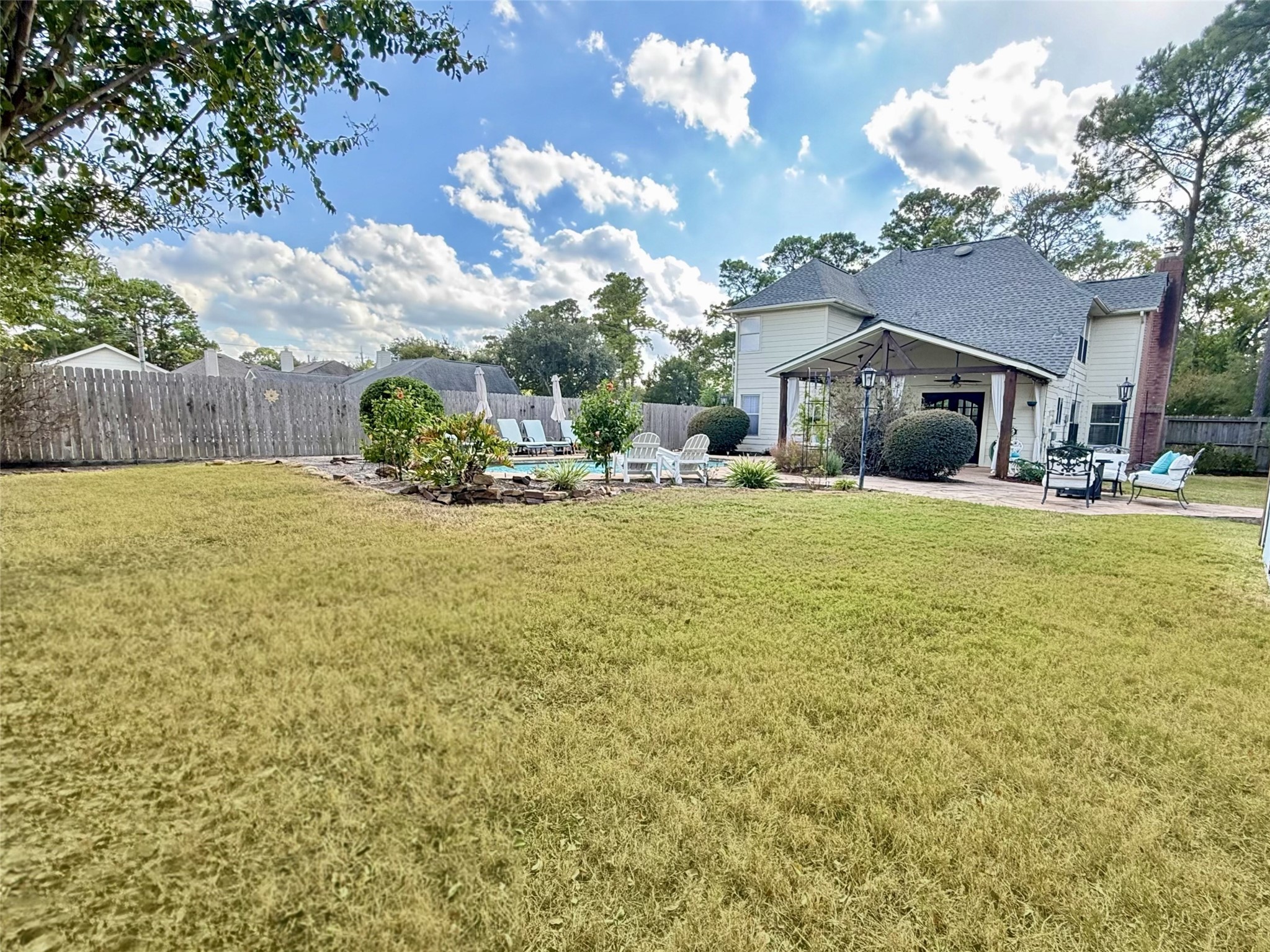16902 Colony Creek Drive Spring, TX 77379 - Photo 18 of 18 a view of a house with a yard