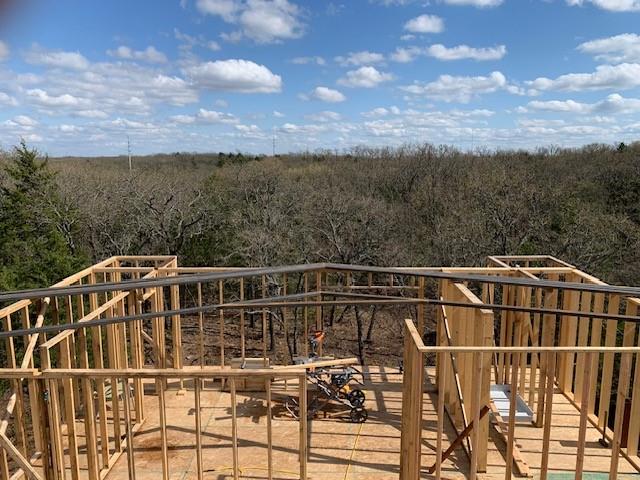 924 The Oil Road Gainesville, TX 76240 - Photo 33 of 39 Erecting Walls and Roof