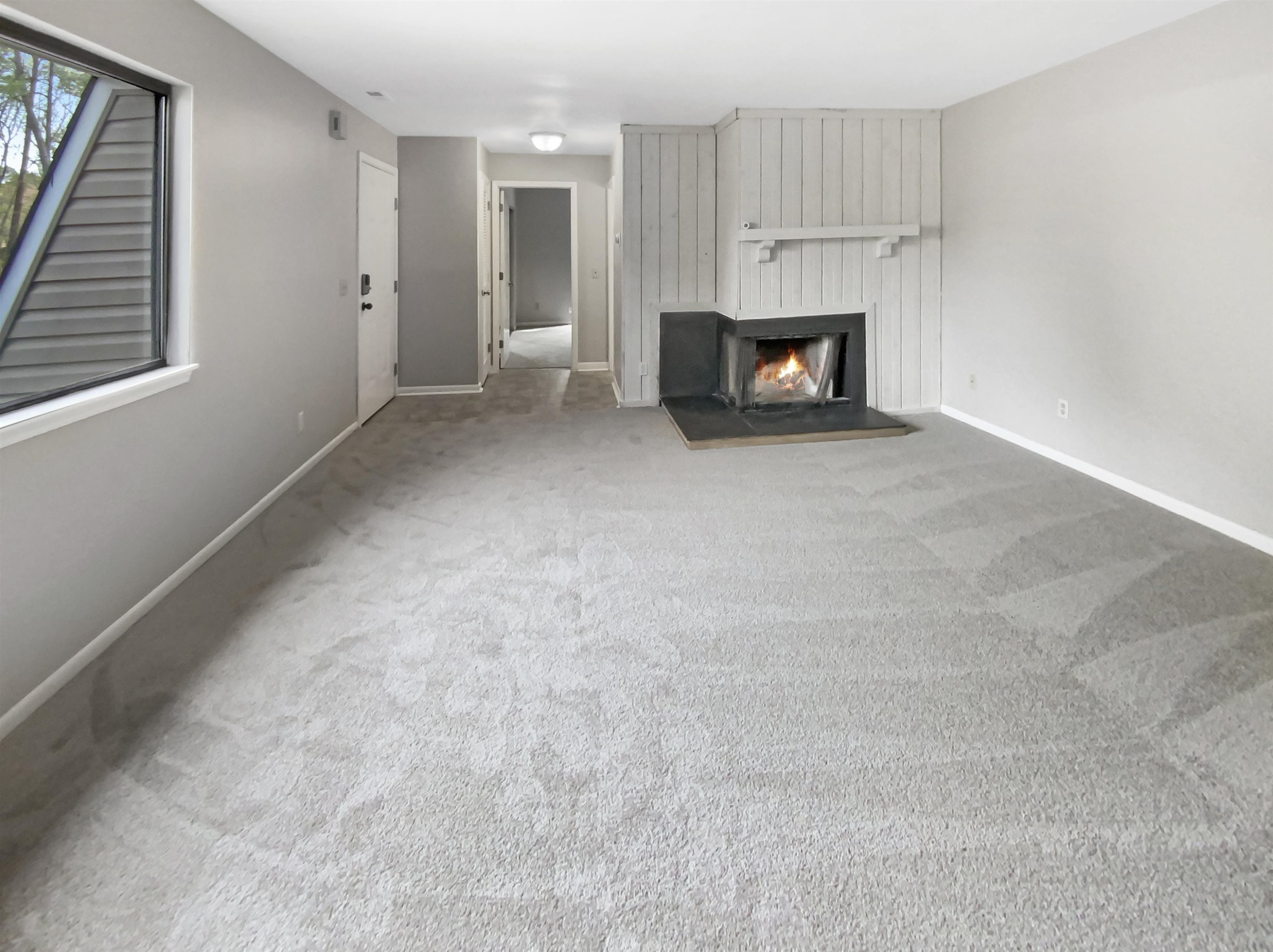 294 Summerwalk Circle Chapel Hill, NC 27517 - Photo 13 of 21 a view of an empty room with a fireplace