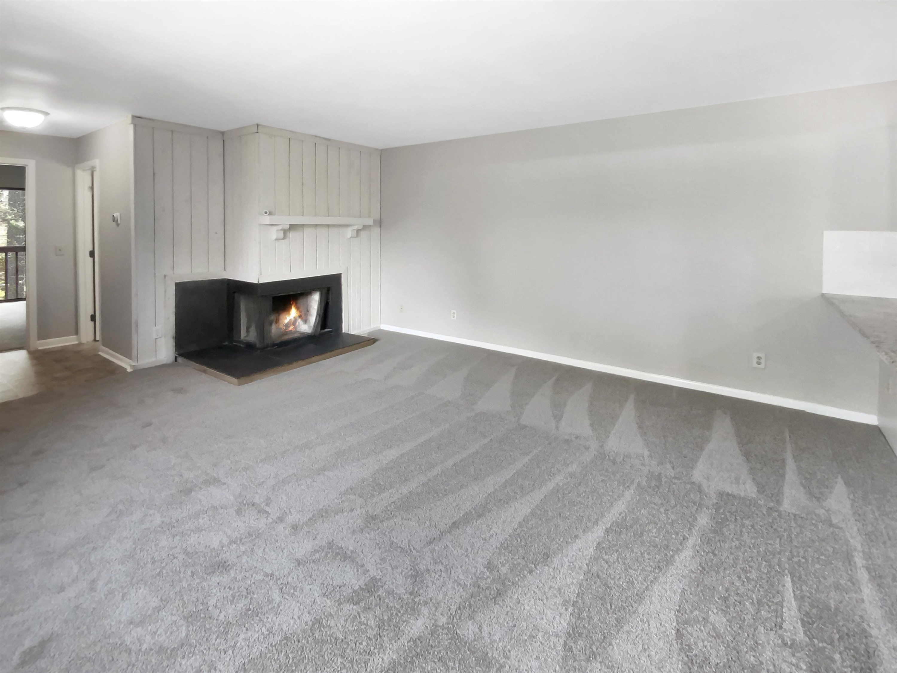 294 Summerwalk Circle Chapel Hill, NC 27517 - Photo 3 of 21 a view of an empty room with a fireplace