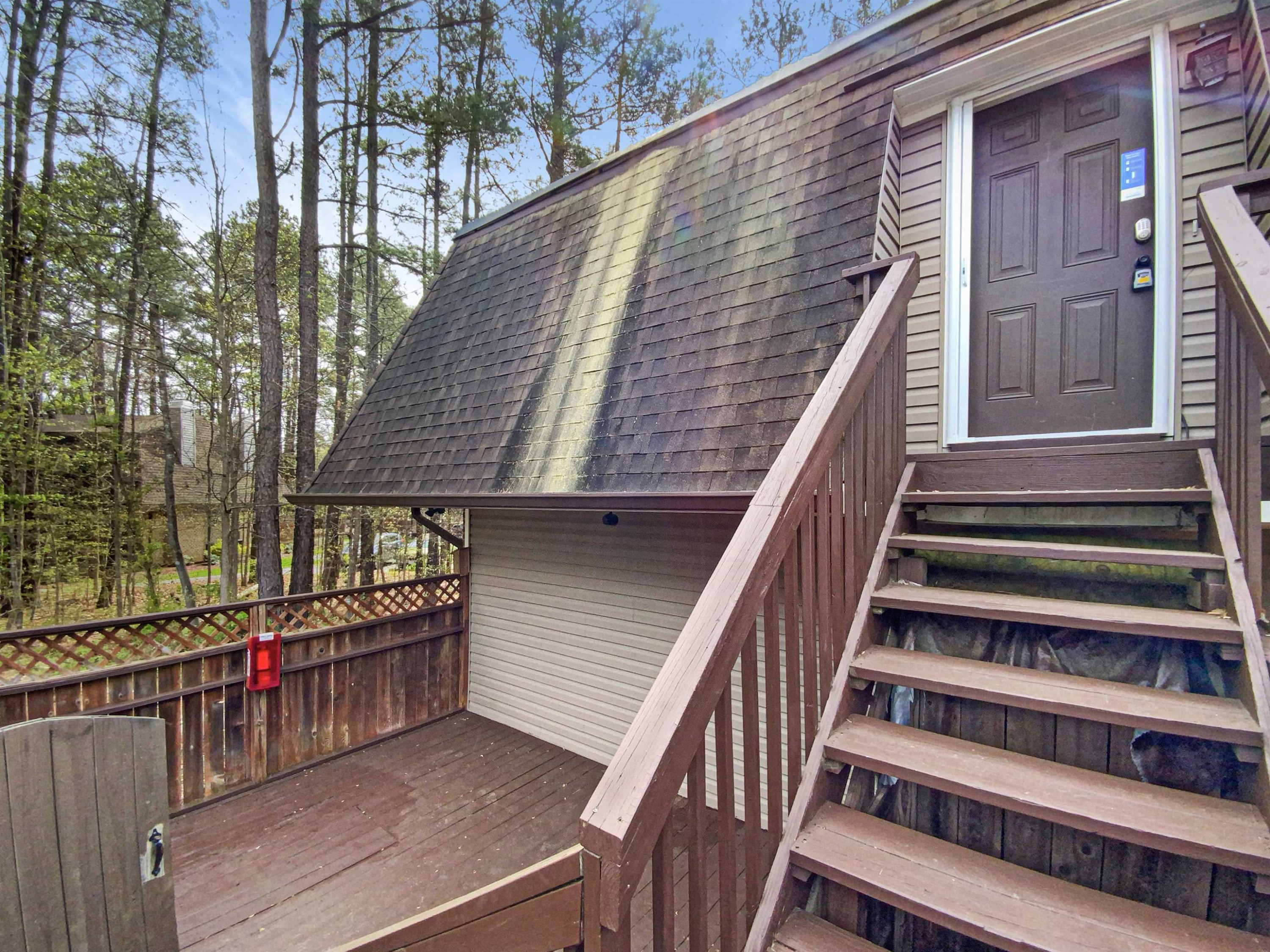 294 Summerwalk Circle Chapel Hill, NC 27517 - Photo 6 of 21 a balcony with wooden floor and outdoor seating