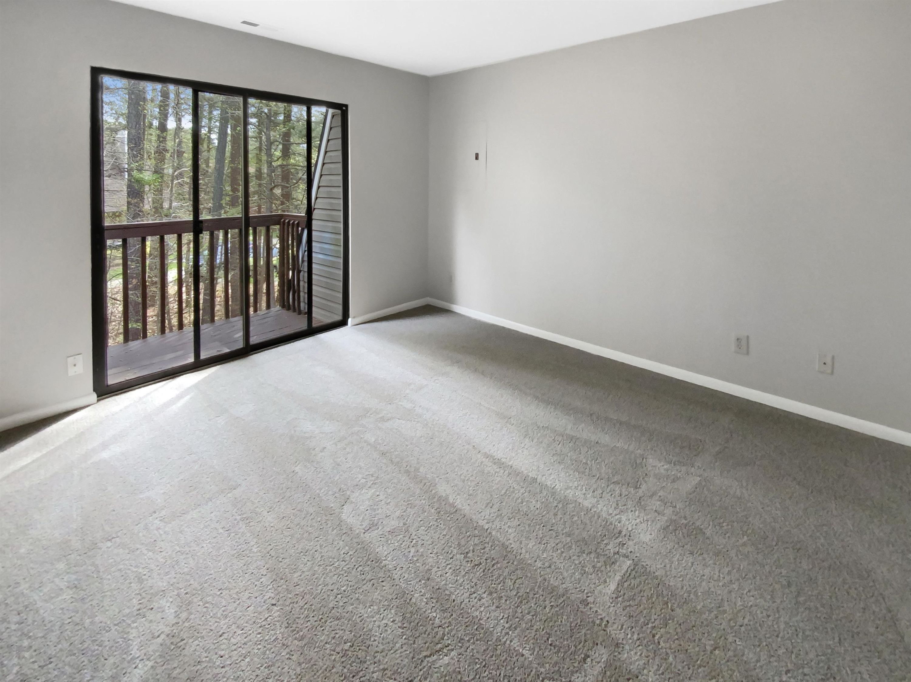294 Summerwalk Circle Chapel Hill, NC 27517 - Photo 8 of 21 a view of an empty room with a window