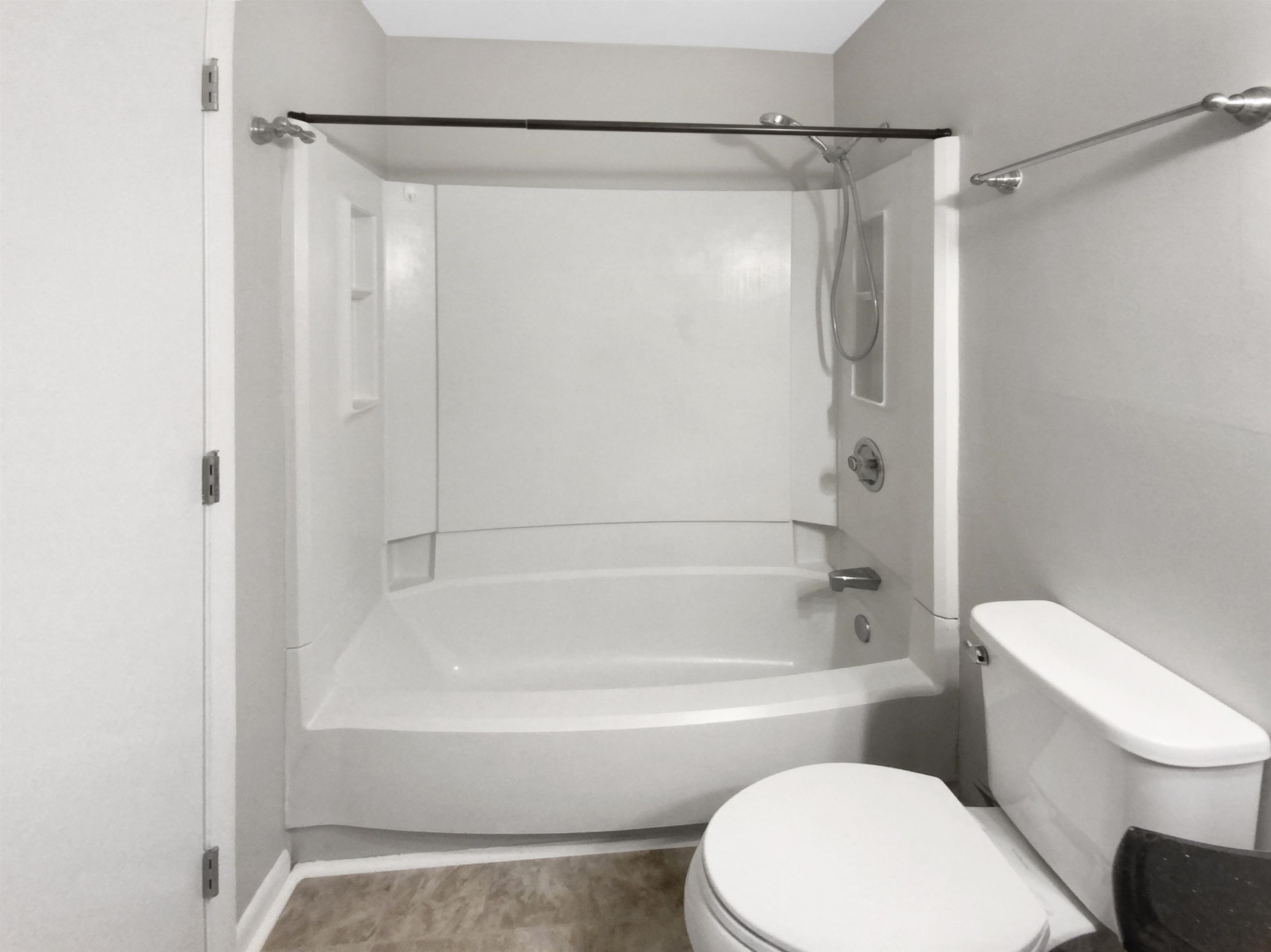 294 Summerwalk Circle Chapel Hill, NC 27517 - Photo 9 of 21 a bathroom with a toilet and a bath tub