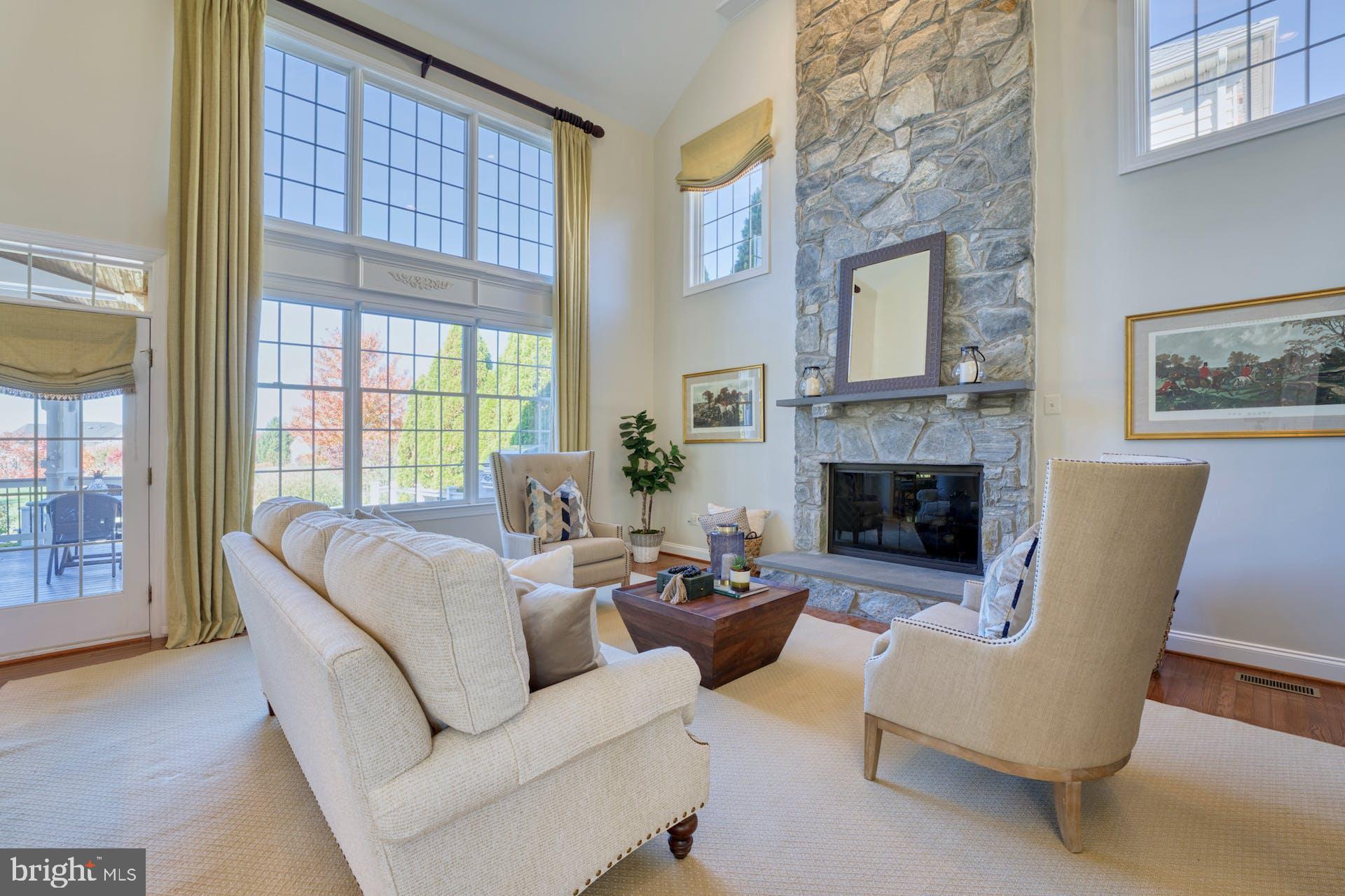 19861 Bethpage Court Ashburn, VA 20147 - Photo 33 of 72 Soaring Stone Fireplace