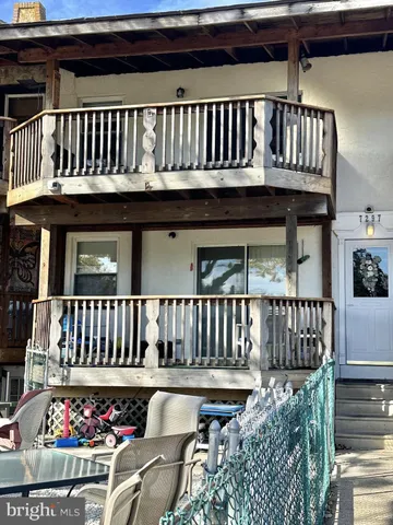 a view of a chairs on the deck
