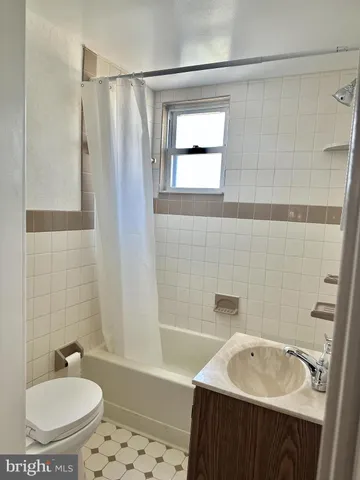 a bathroom with a sink and a bathtub