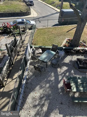a view of a terrace with seating area