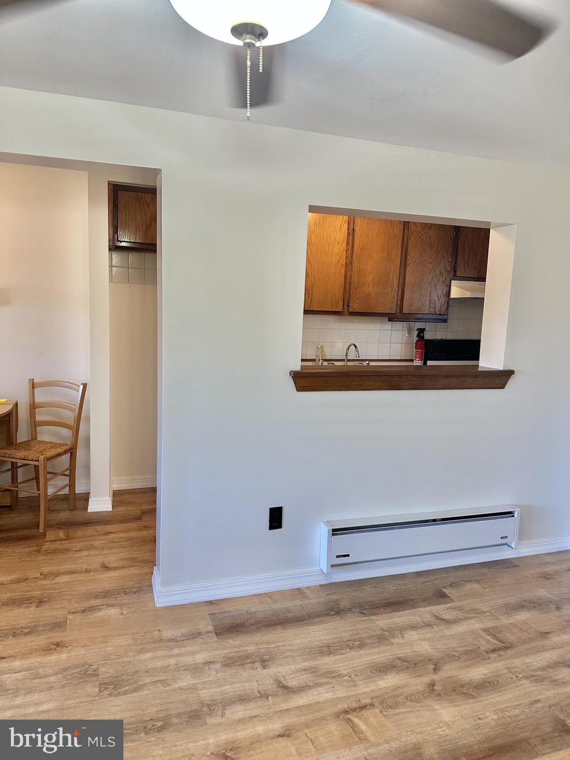 7297 C Guilford Road Upper Darby, PA 19082 - Photo 5 of 16 a view of kitchen with microwave and cabinets