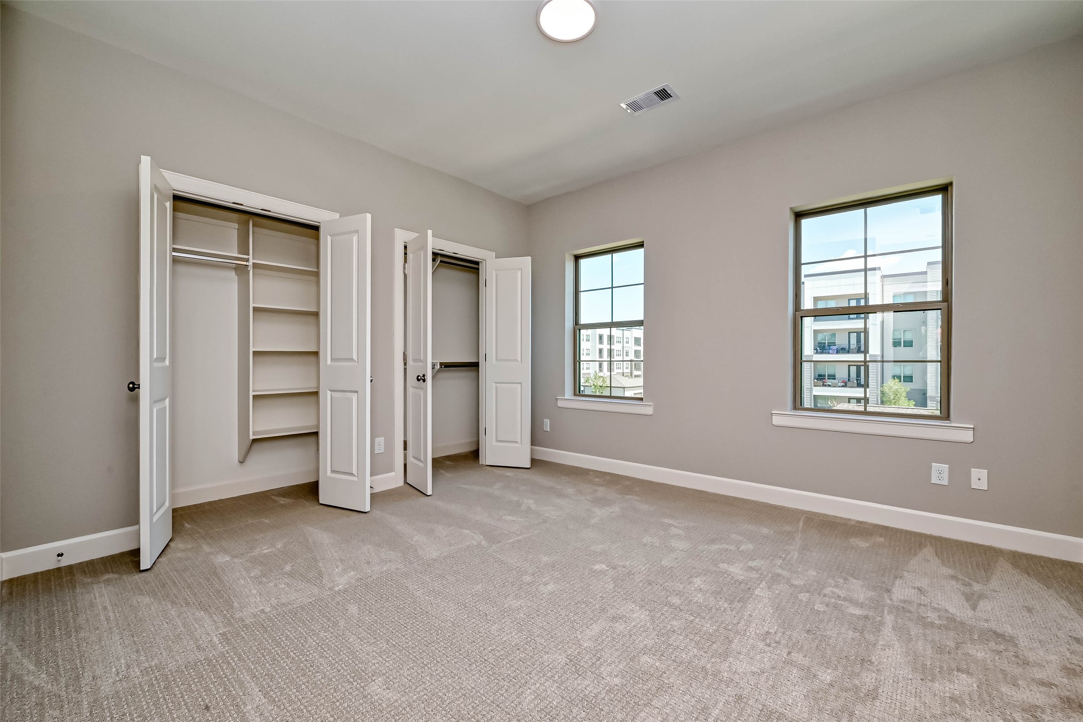 1908 Carrollton Mill Drive Spring, TX 77380 - Photo 17 of 40 an empty room with closet and windows