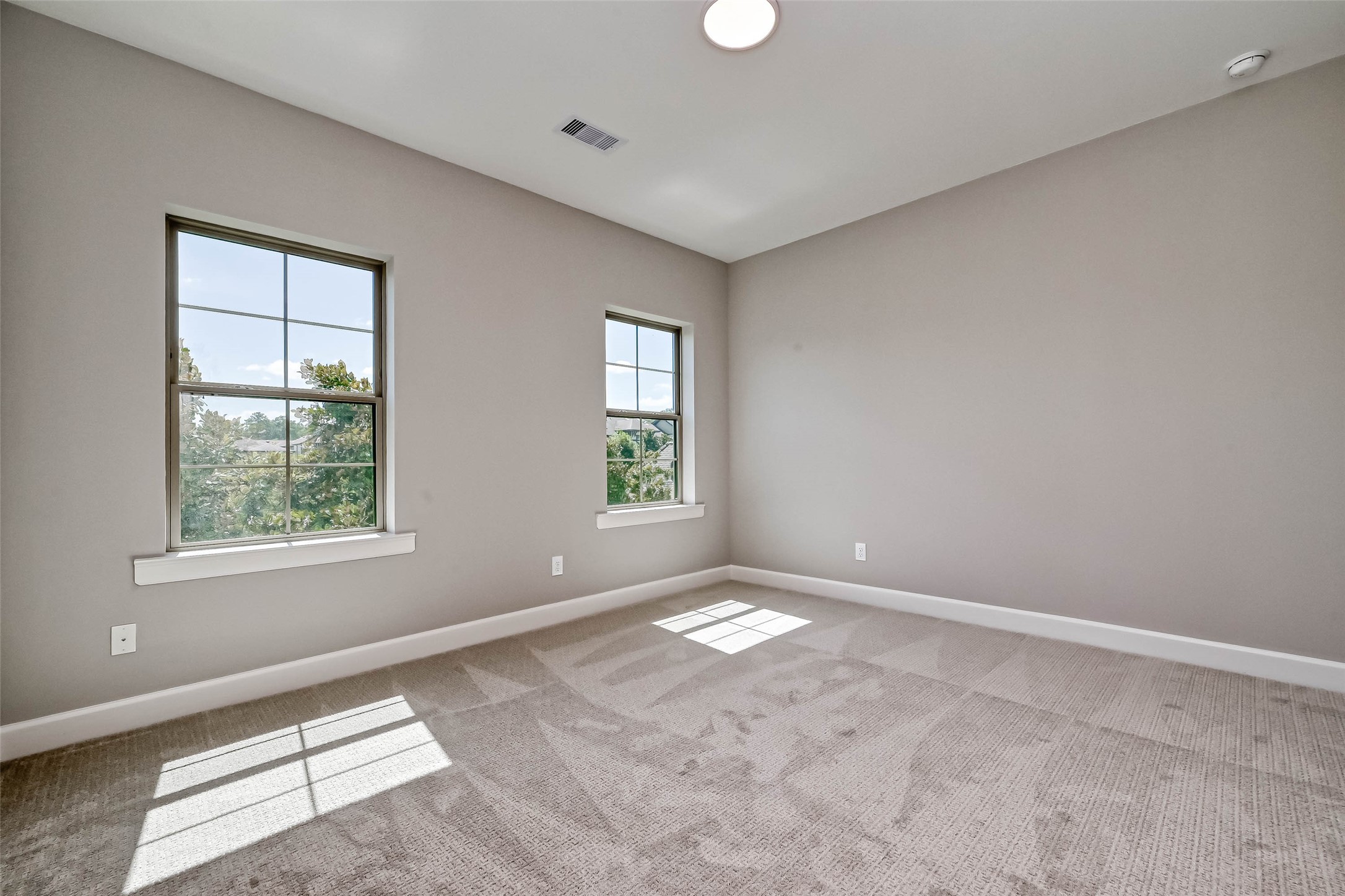 1908 Carrollton Mill Drive Spring, TX 77380 - Photo 21 of 40 an empty room with windows