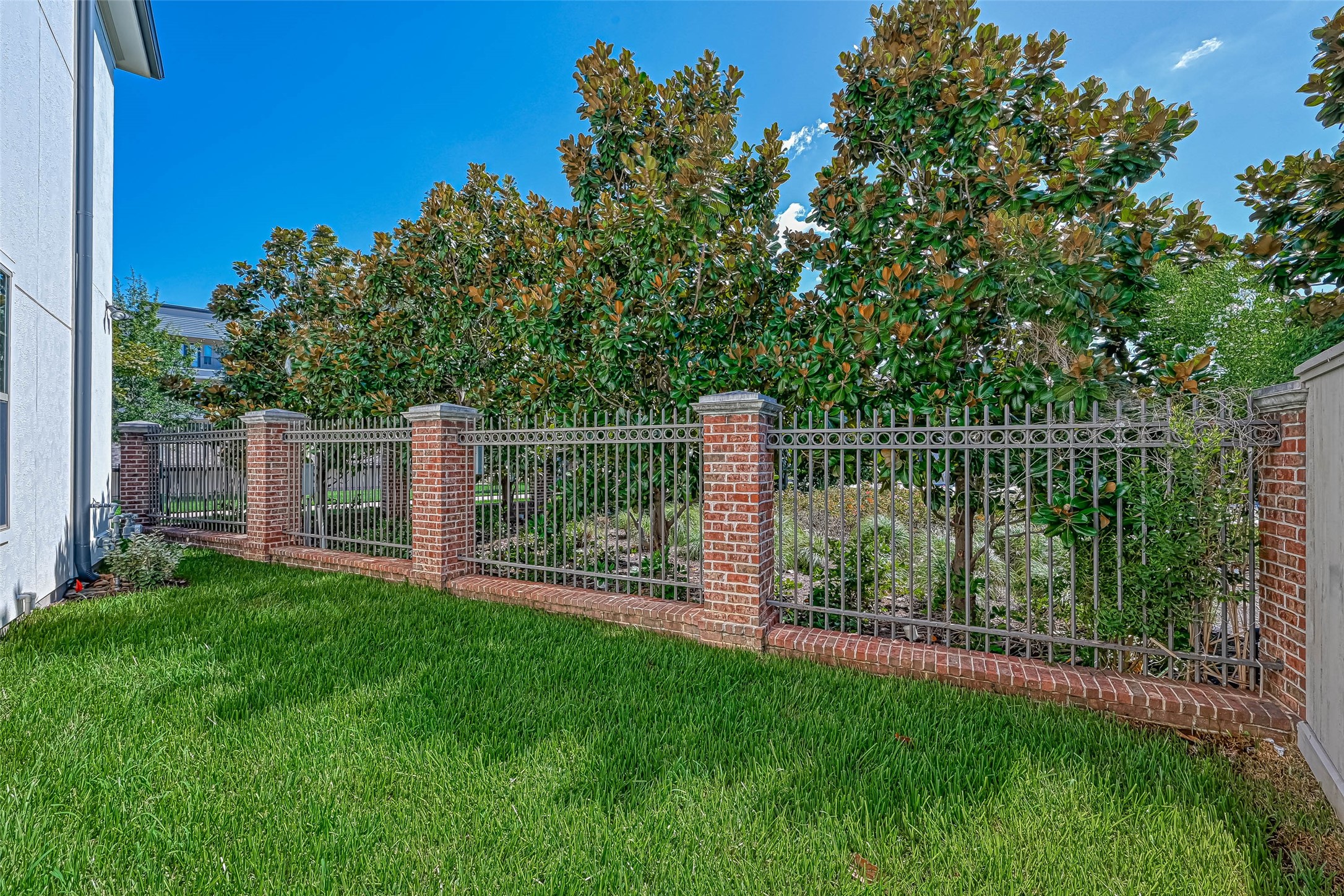 1908 Carrollton Mill Drive Spring, TX 77380 - Photo 34 of 40 a view of a yard with a wooden fence