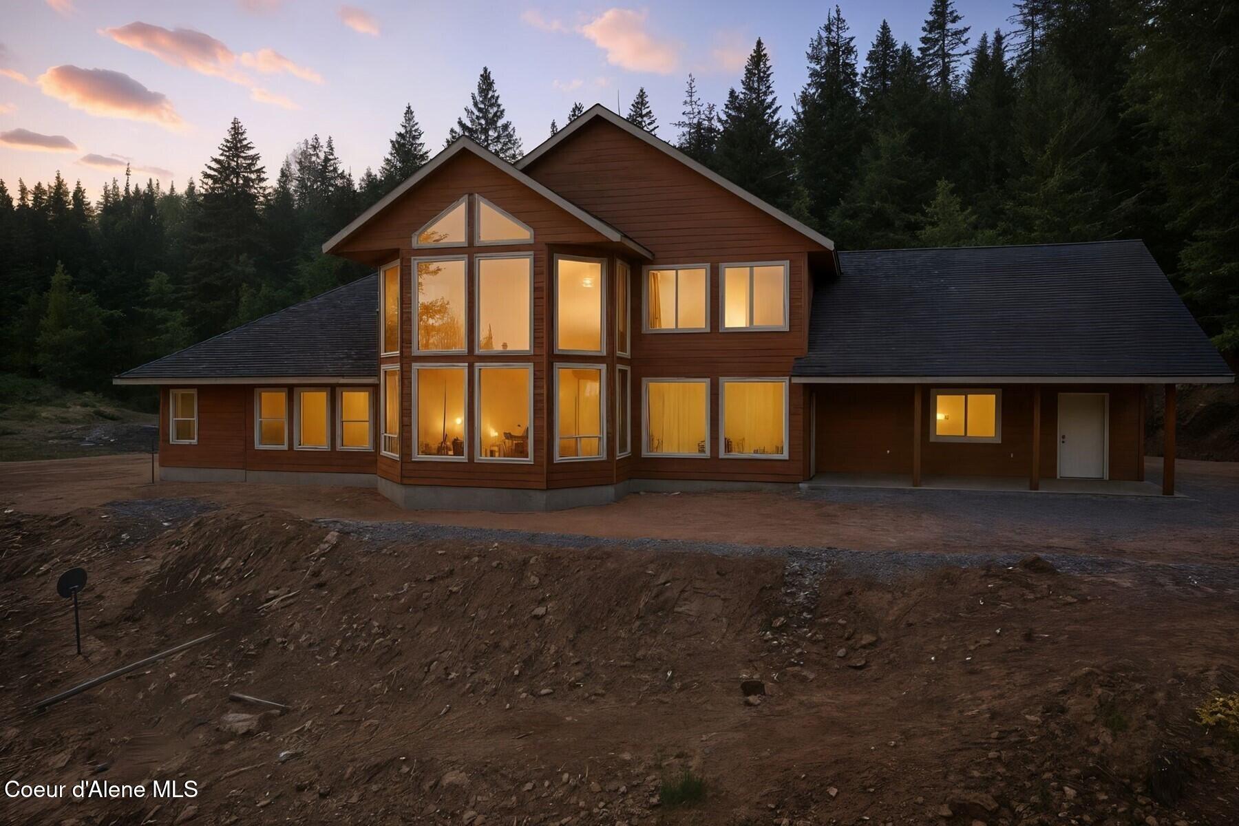 14830 Dufort Road Priest River, ID 83856 - Photo 3 of 74 3_DJI_0971_twilight_6c1947941ab3