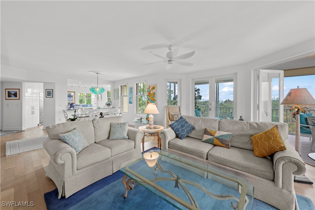 2605 Wulfert Road, Unit 5 Sanibel, FL 33957 - Photo 11 of 44 a living room with furniture and a large window