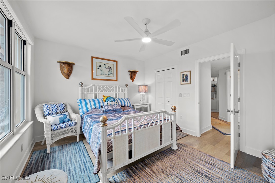 2605 Wulfert Road, Unit 5 Sanibel, FL 33957 - Photo 22 of 44 a bed room with a bed and a window