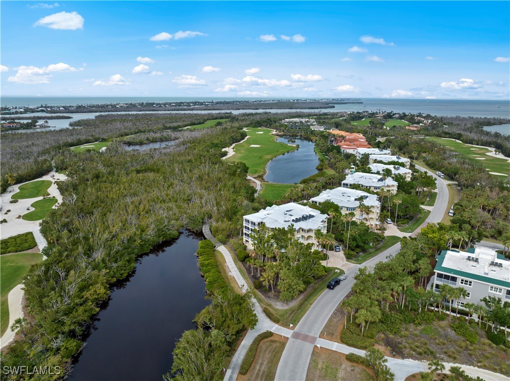 2605 Wulfert Road, Unit 5 Sanibel, FL 33957 - Photo 39 of 44 a view of a lake with a city