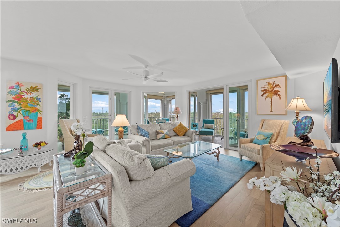 2605 Wulfert Road, Unit 5 Sanibel, FL 33957 - Photo 8 of 44 a living room with furniture and a window