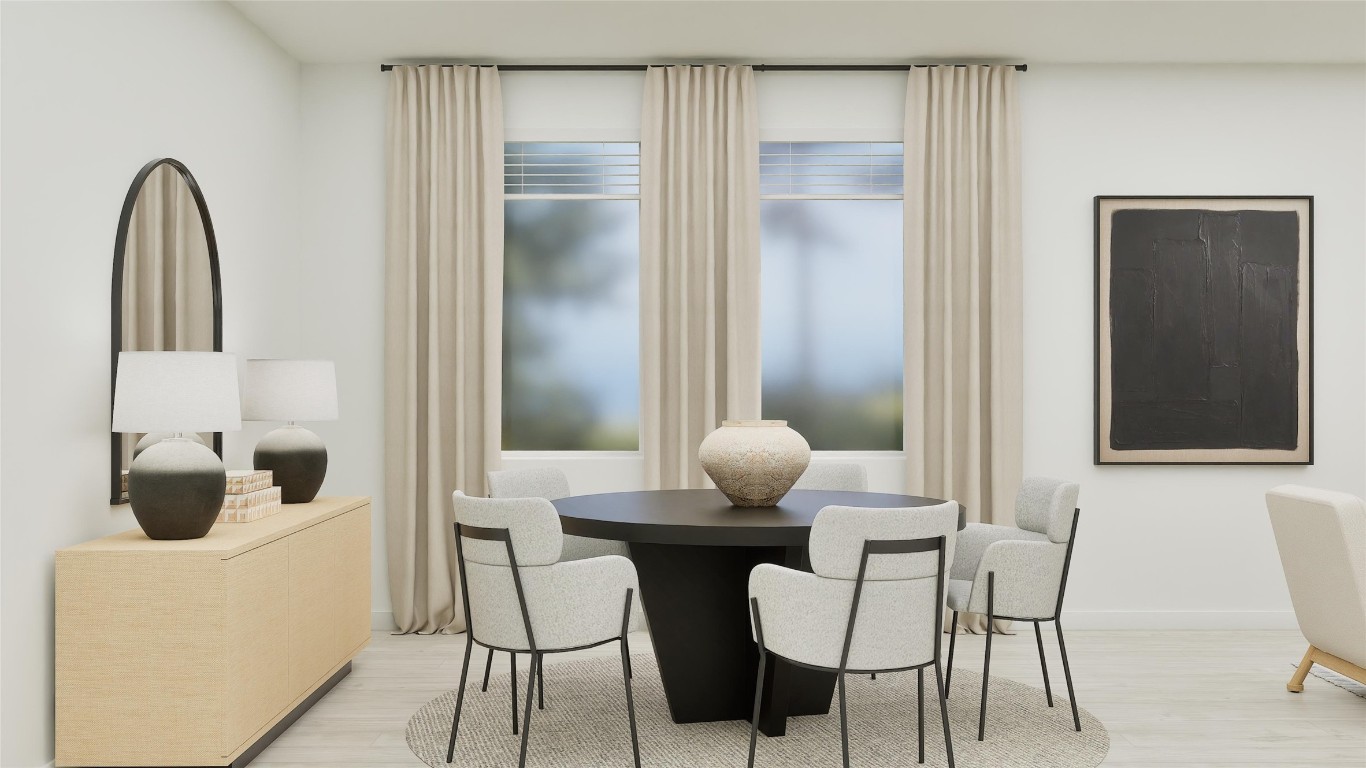 13312 Winton Drive Elgin, TX 78621 - Photo 21 of 35 a view of a dining room with furniture and wooden floor