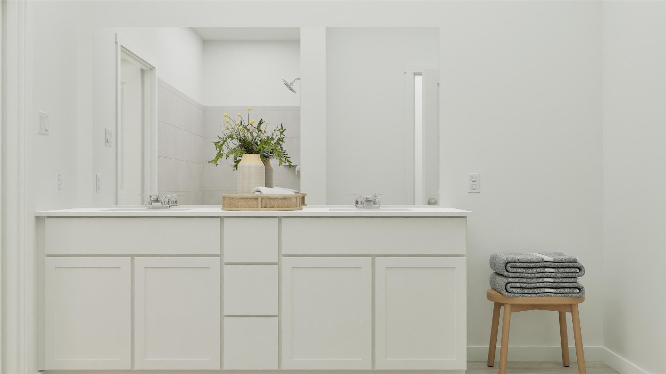 13312 Winton Drive Elgin, TX 78621 - Photo 32 of 35 a bathroom with a sink and a mirror