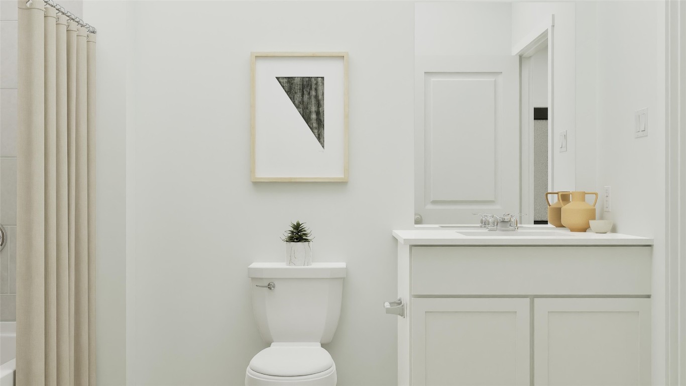 13312 Winton Drive Elgin, TX 78621 - Photo 34 of 35 a bathroom with a toilet sink and mirror