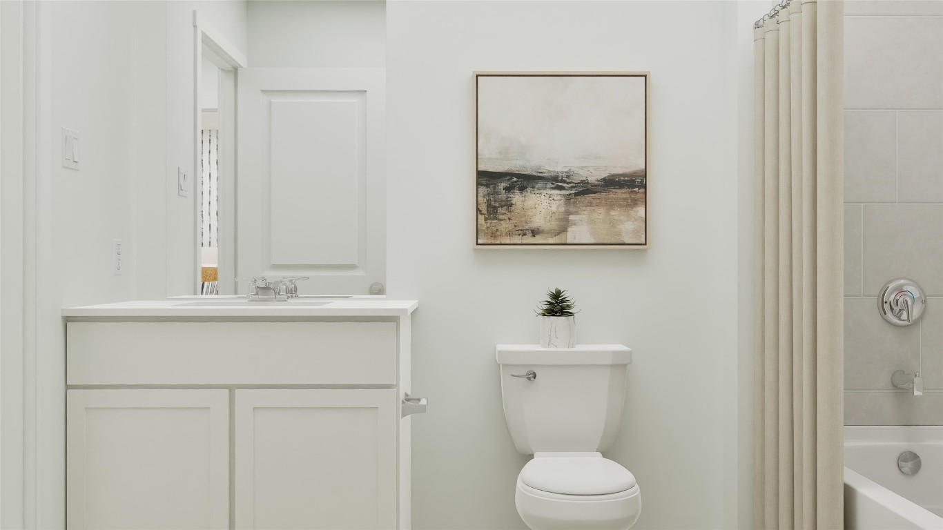 13312 Winton Drive Elgin, TX 78621 - Photo 35 of 35 a bathroom with a sink mirror vanity and toilet