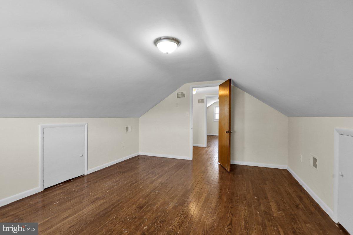 2326 Fairview Street Reading, PA 19609 - Photo 14 of 27 a view of a room with wooden floors and stairs