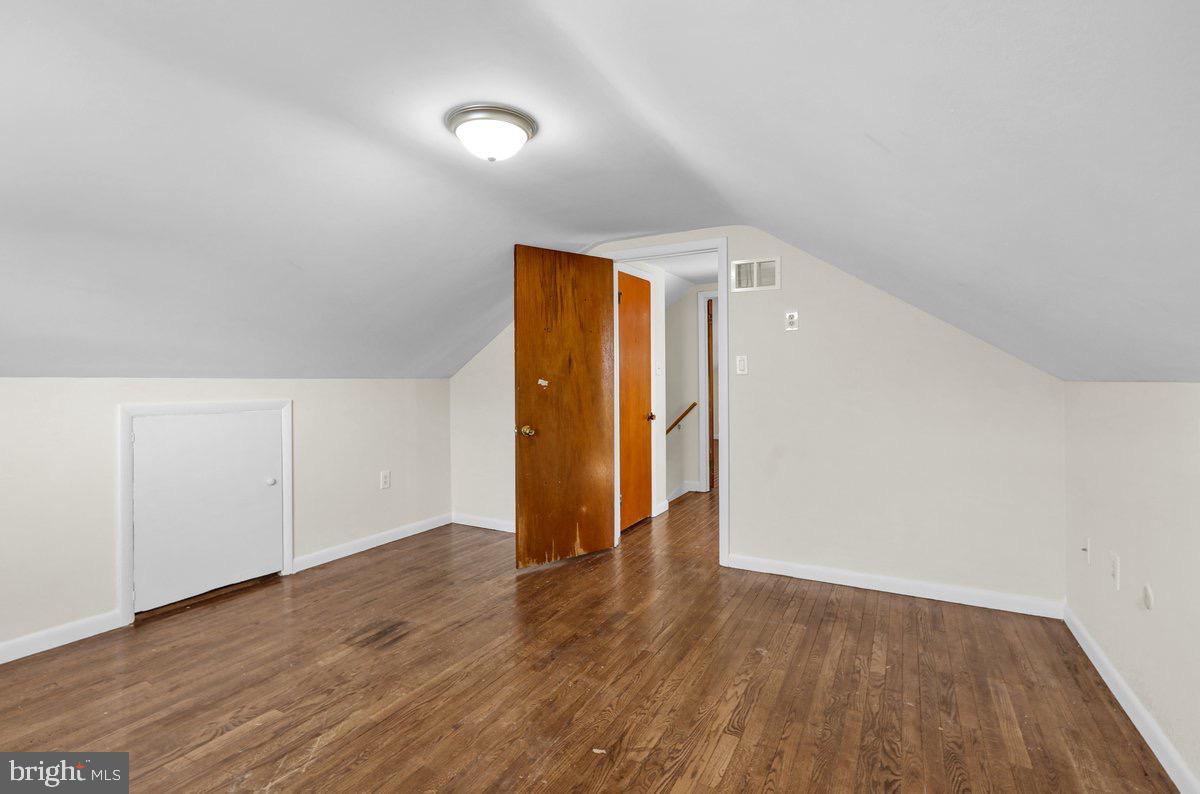 2326 Fairview Street Reading, PA 19609 - Photo 17 of 27 a view of an empty room with wooden floor