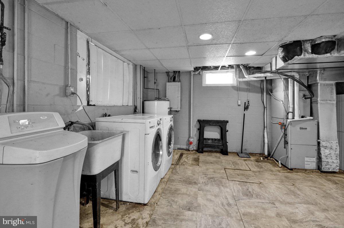 2326 Fairview Street Reading, PA 19609 - Photo 22 of 27 a bathroom with a sink a toilet and a shower