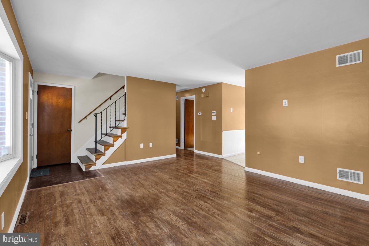 2326 Fairview Street Reading, PA 19609 - Photo 4 of 27 wooden floor in an empty room with a window